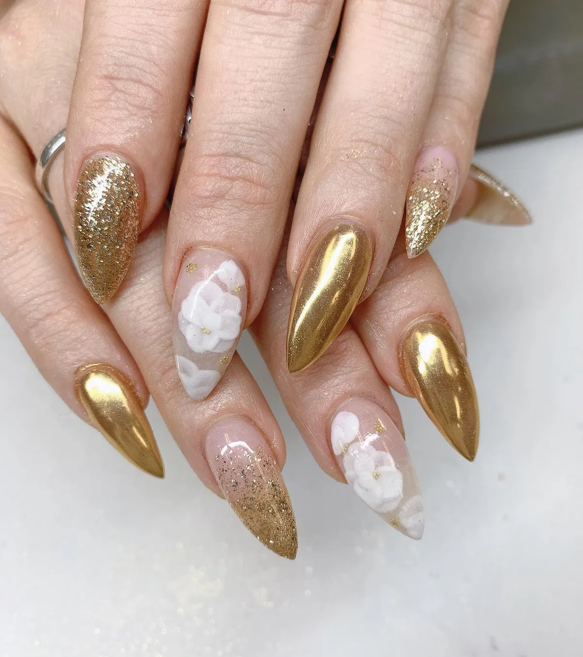 Stiletto Mix: Solid Gold, Gold Glitter, and White Floral Accents