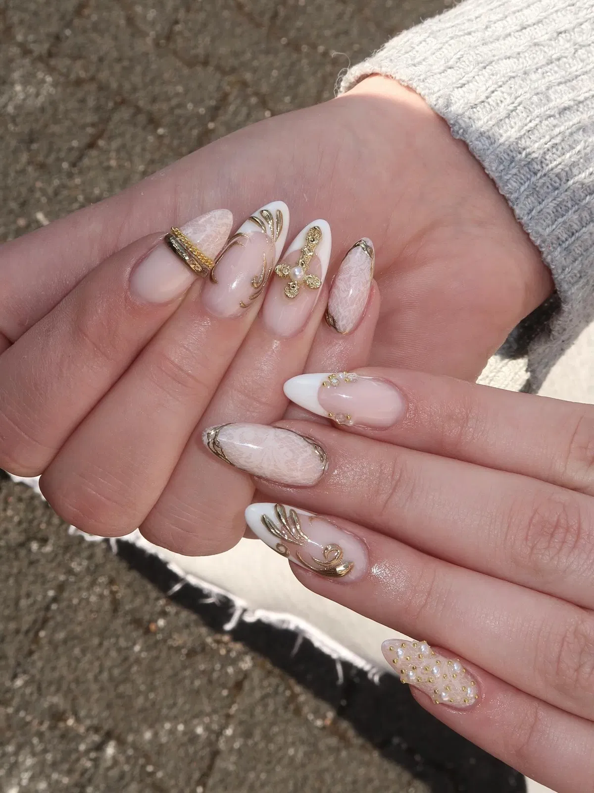 Soft white-and-gold accents with lace-like patterns and butterfly charm