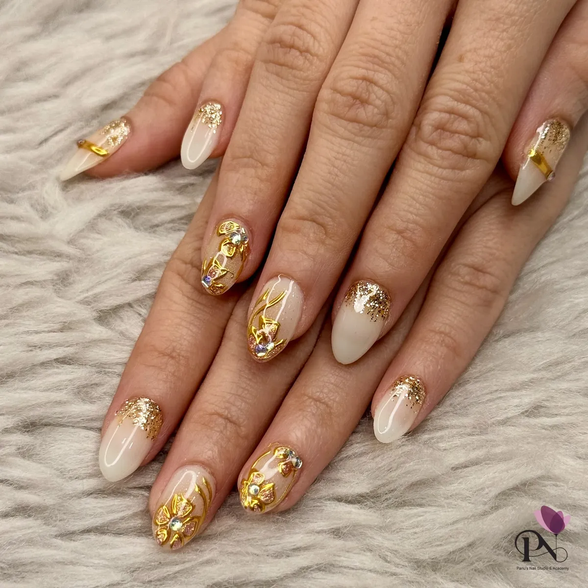 Gold glitter gradients with floral and rhinestone accents