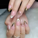 💛 17 Elegant Gold Nails Acrylic Looks That Feel Pure Luxury Fashion image by @unas.acrilicas.trujillo