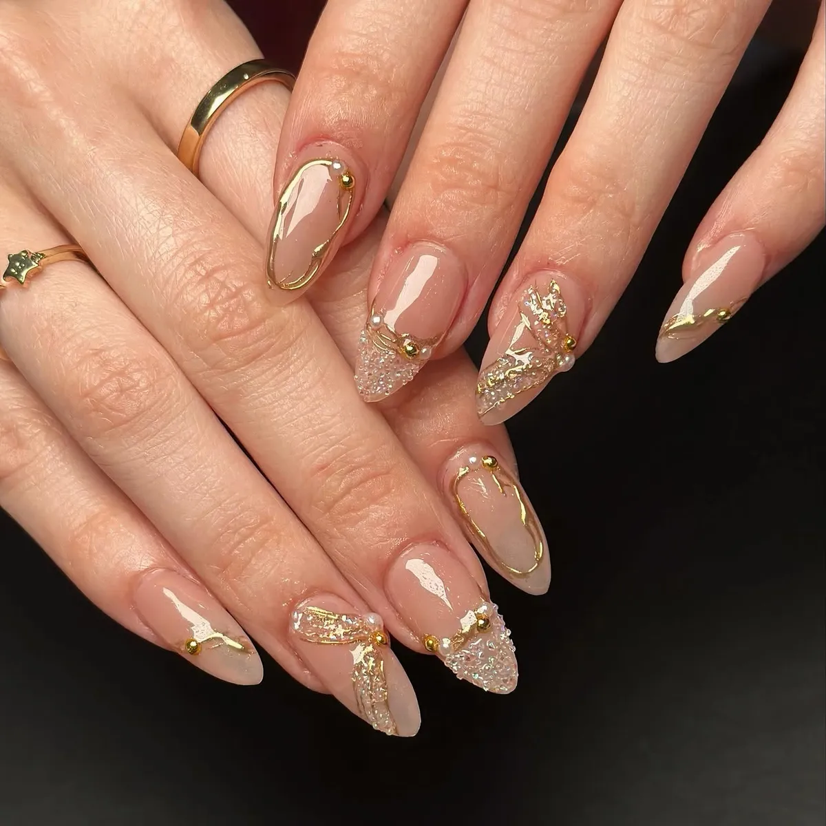 Gold outlines with champagne glitter accent tips