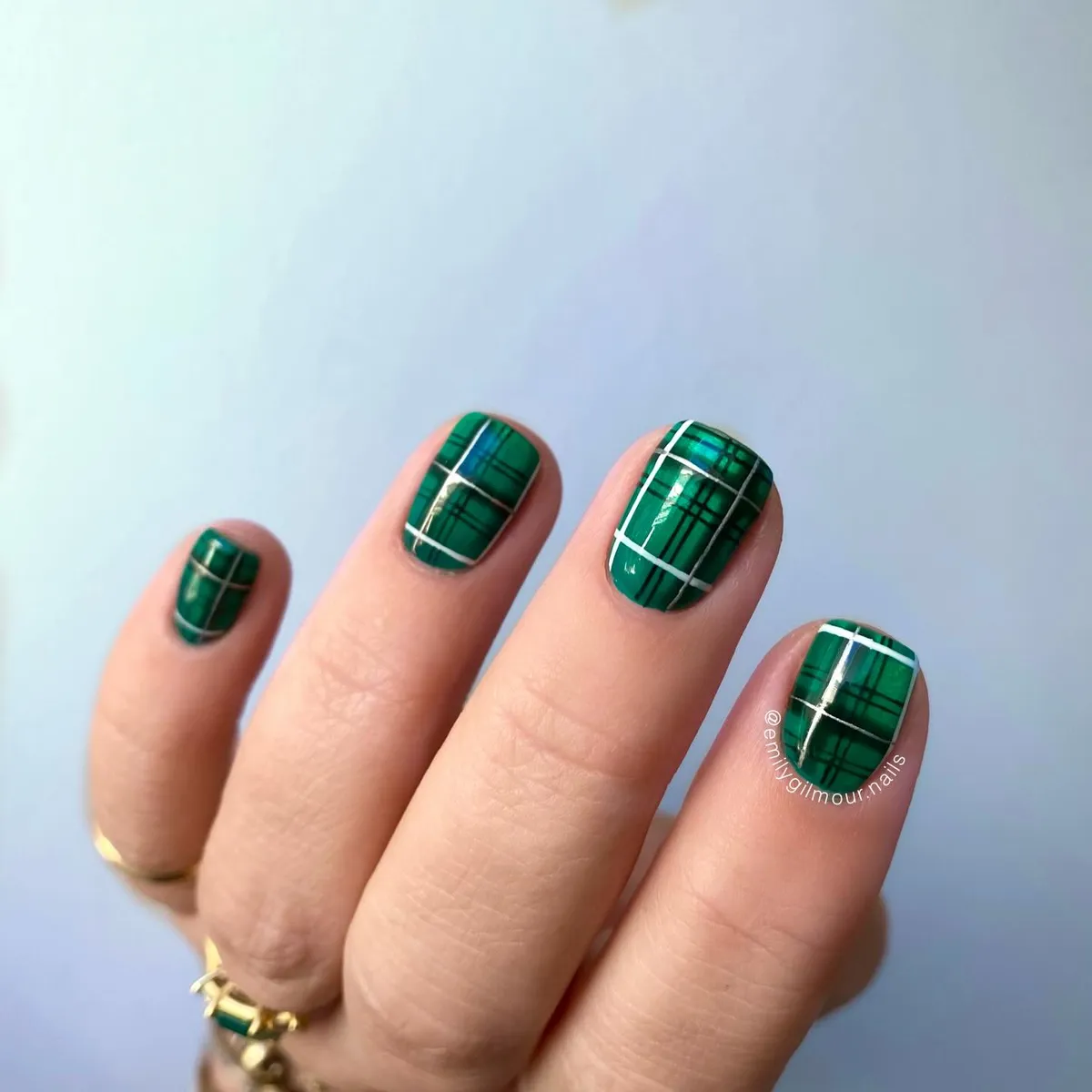Classic dark green plaid with crisp white grid lines
