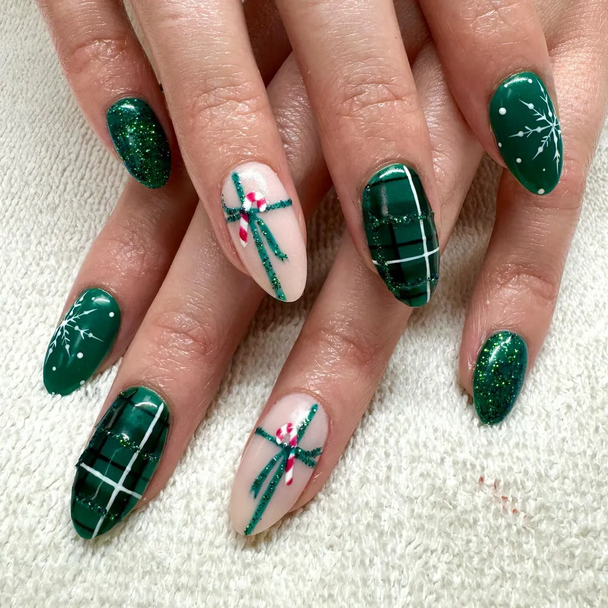 Glittery green plaid mixed with candy-cane and snowflake accents