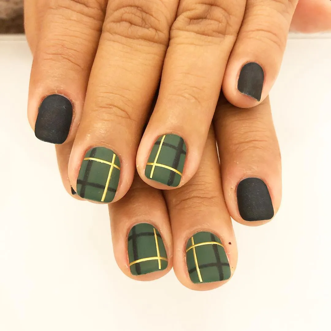 Matte black paired with dark green plaid and gold striping