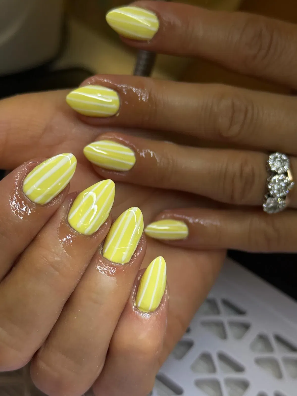 Yellow Nails with Thin White Vertical Stripes