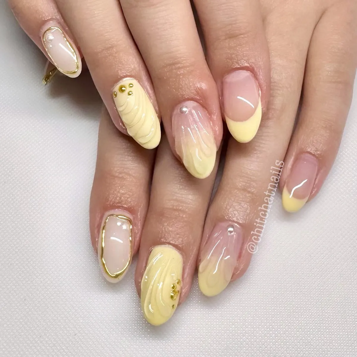 Pale Yellow French Tips with Swirl and Gold Outline Details