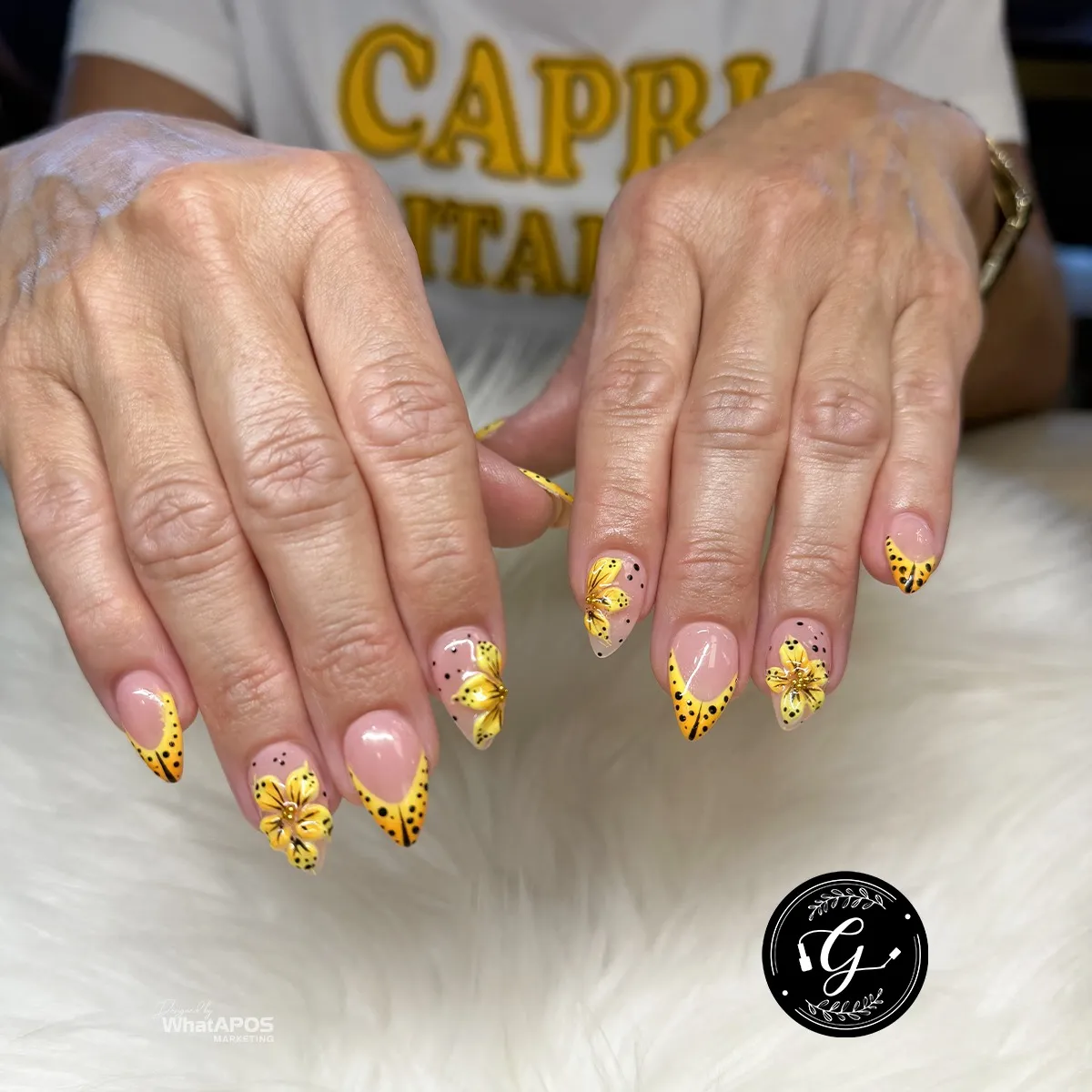 Yellow French Tips with Black Dots and Floral Accents