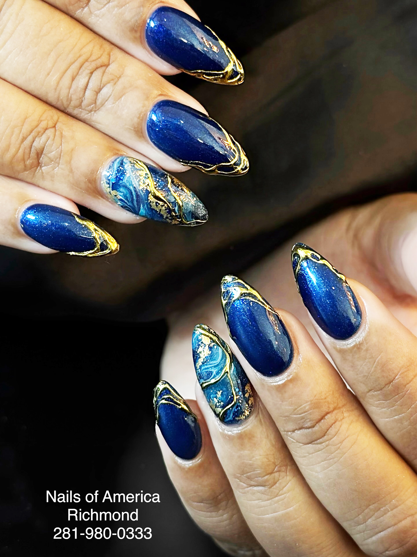 Shimmery navy with gold edging and marbled accent