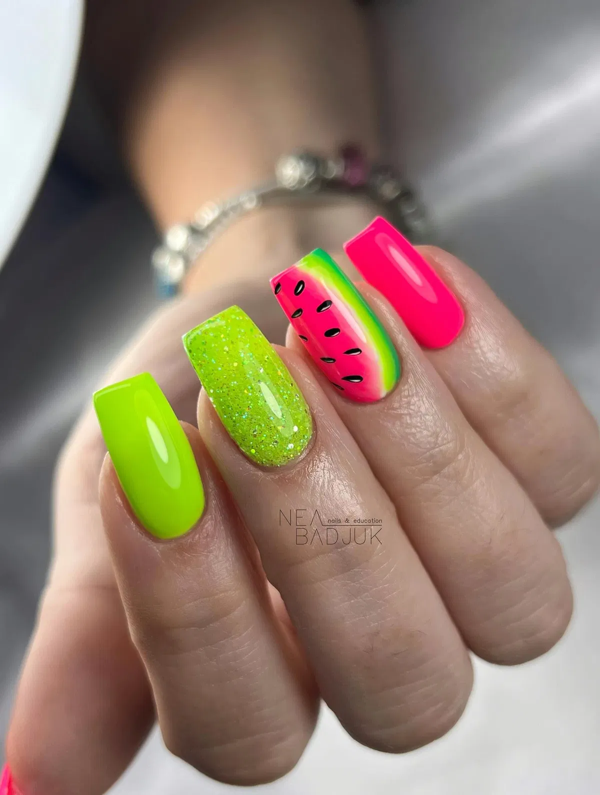 Neon green and hot pink with seed-pattern accent