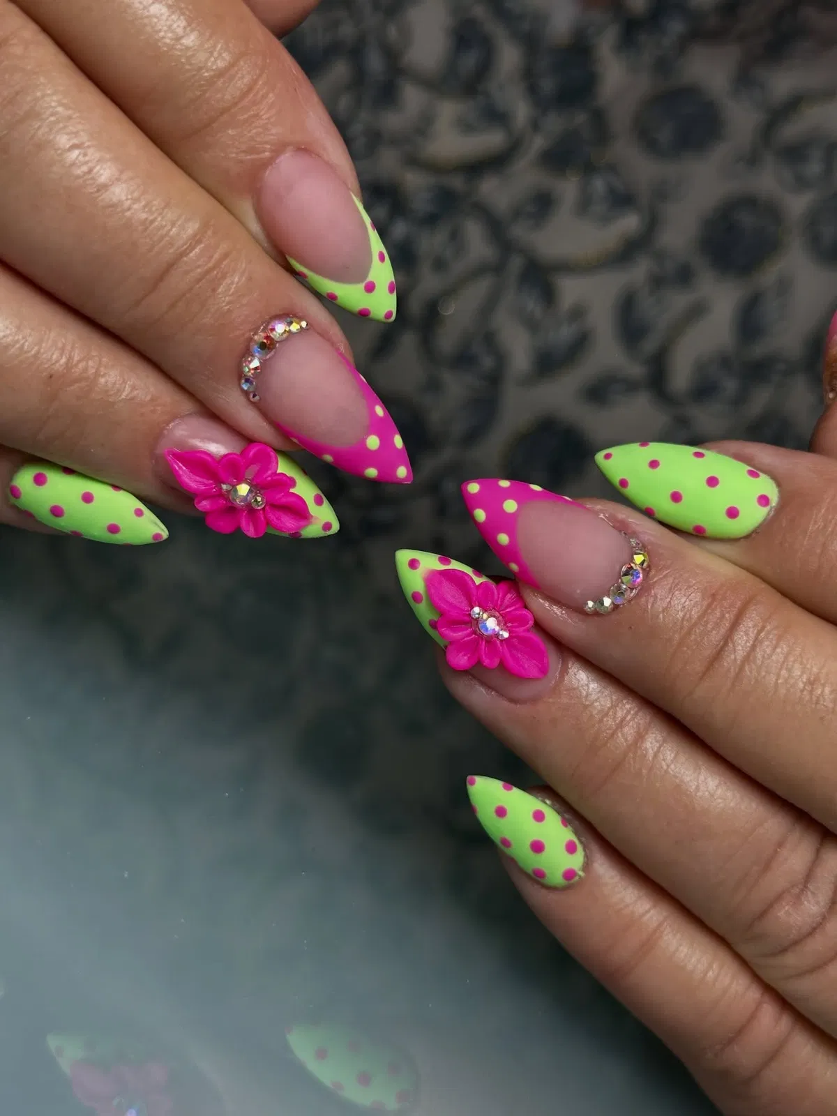 Neon green and hot pink polka-dot tips with 3D flowers