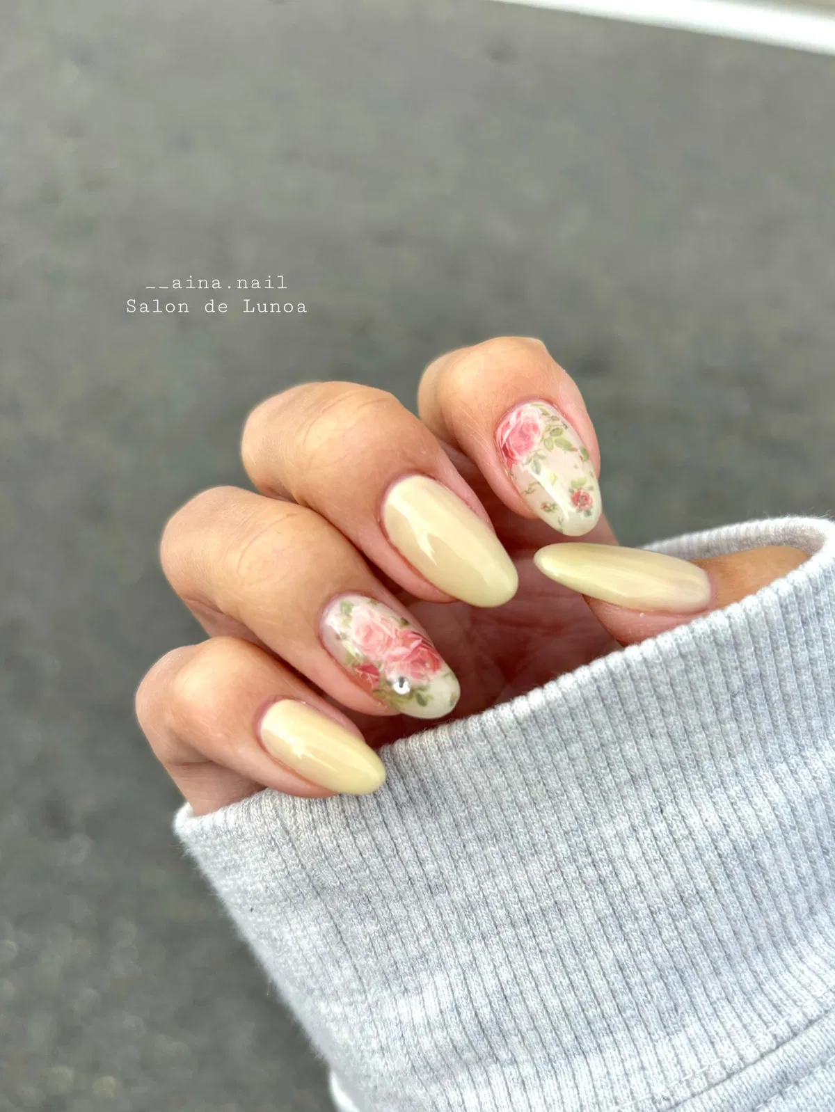 Creamy pale yellow with rose-style floral print accents
