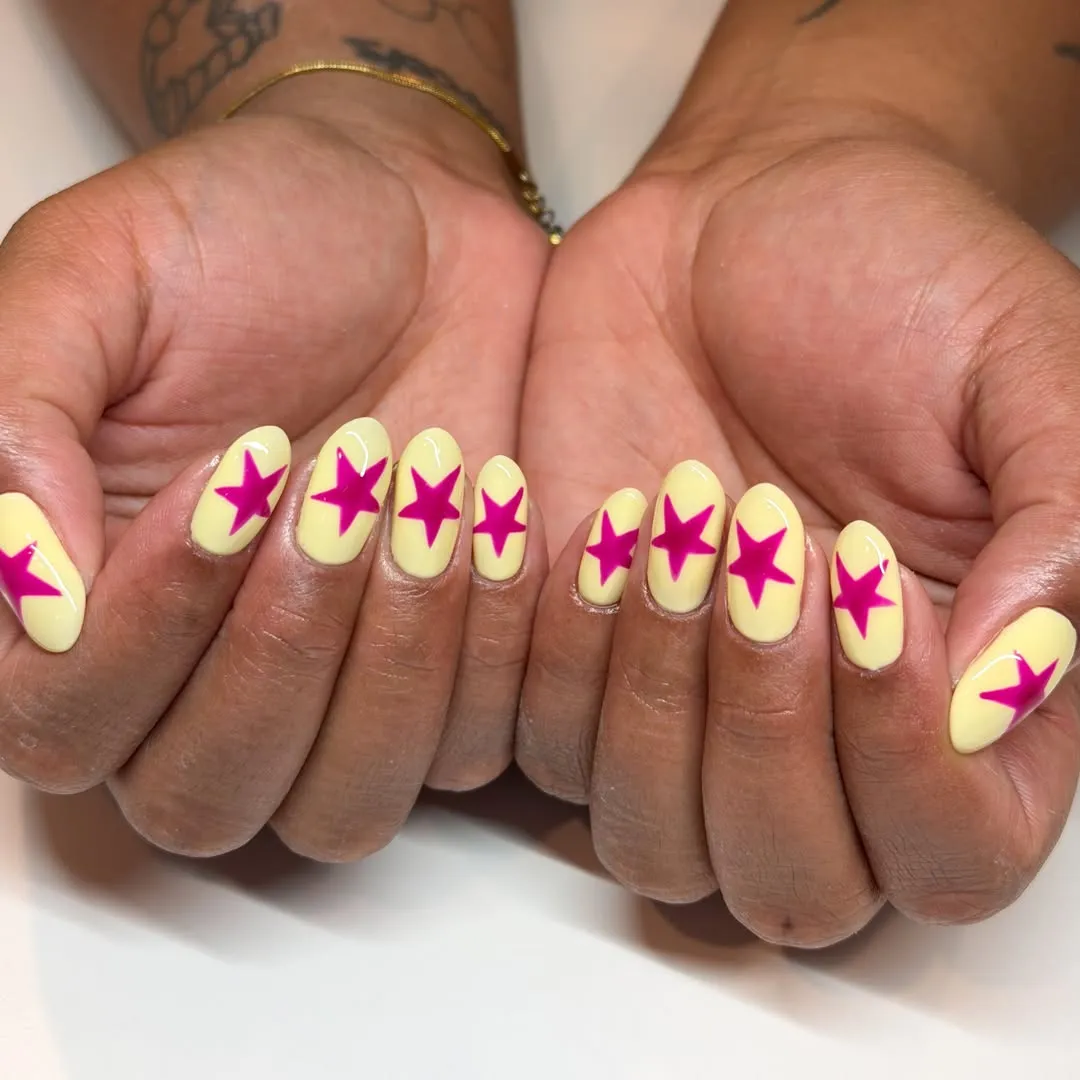 Hot Pink Stars on Pale Yellow Nails
