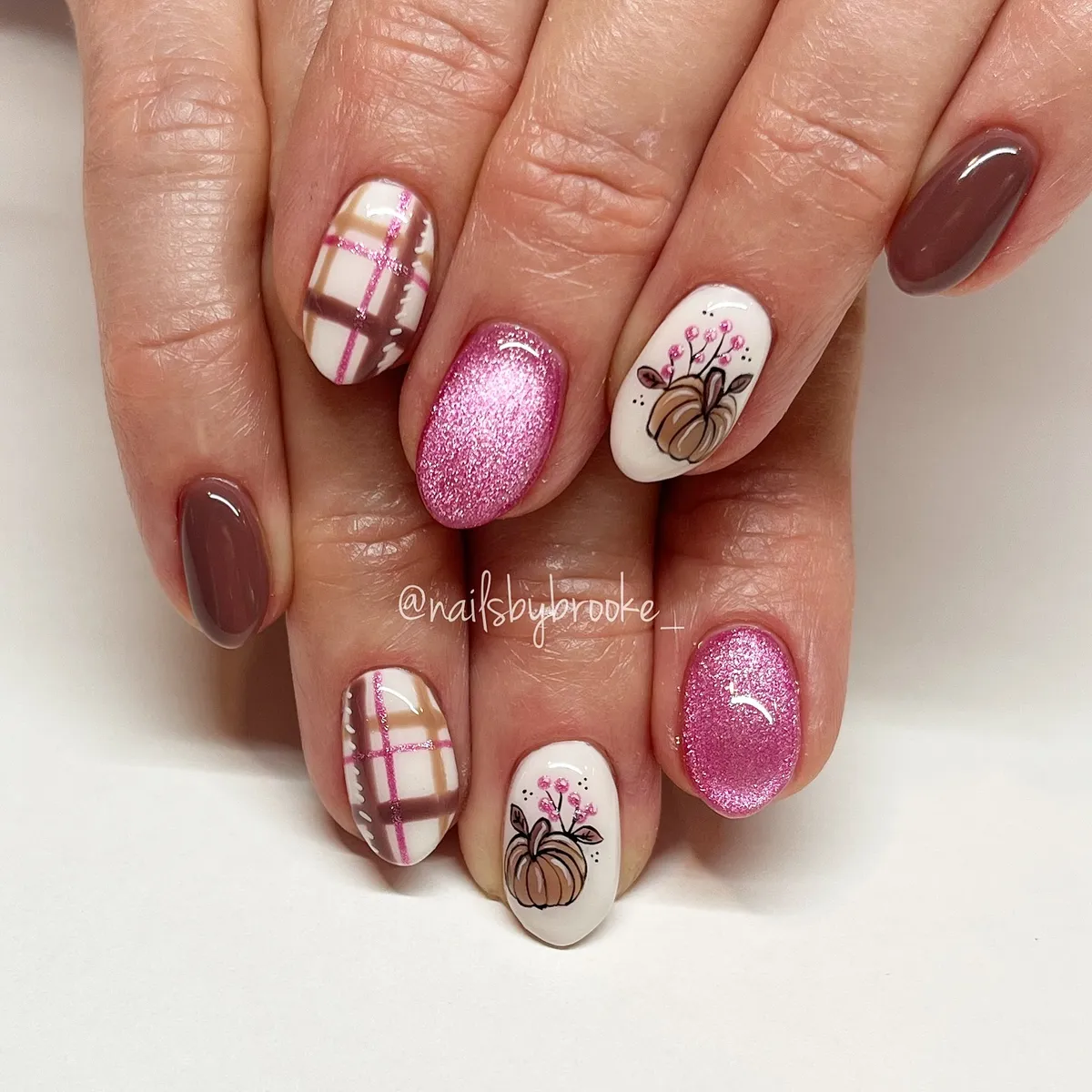 Brown, pink glitter, plaid, and pumpkin accents