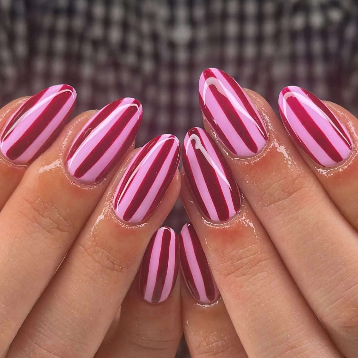 Vertical pink and burgundy stripes