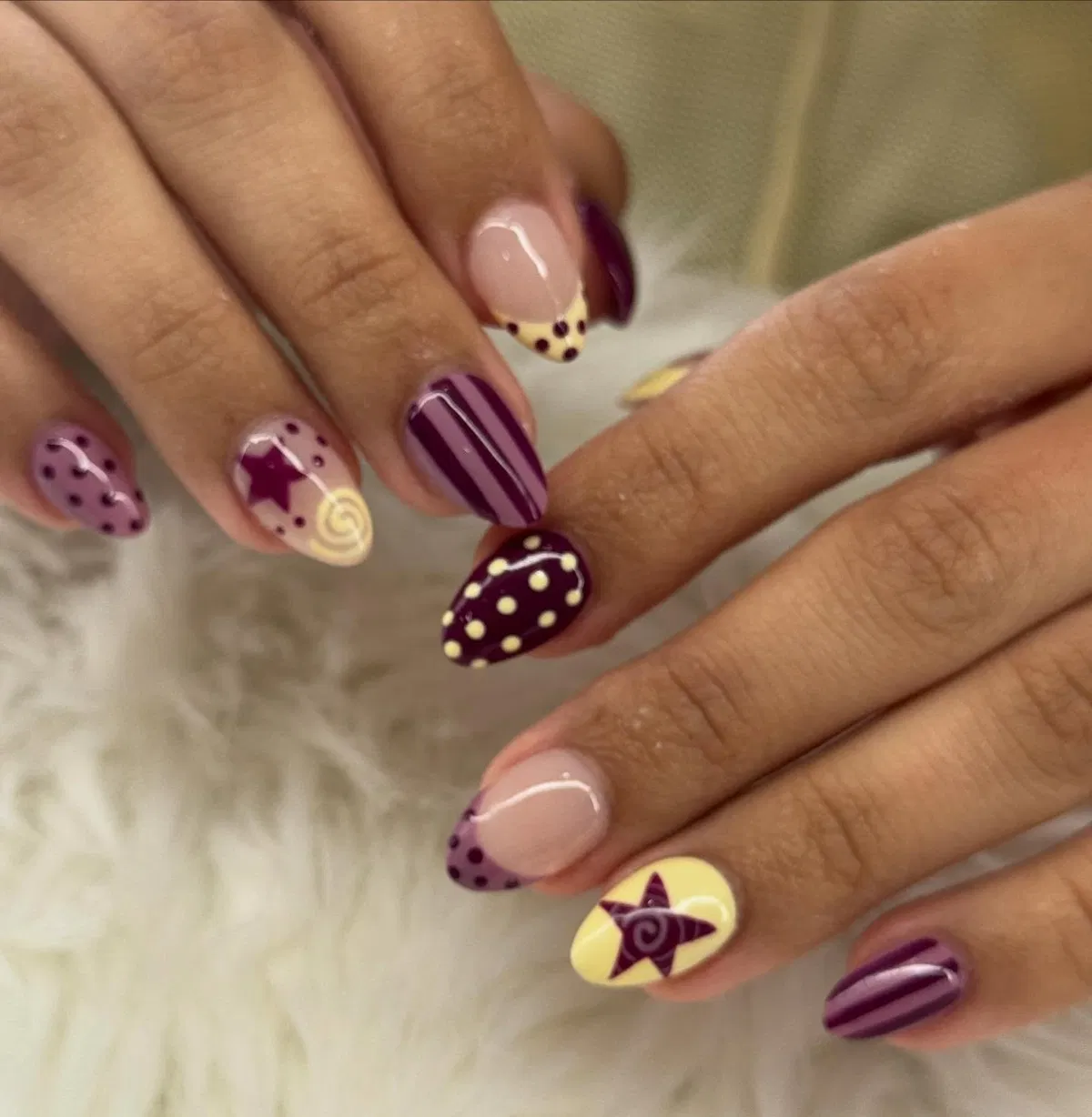 Stars, stripes, and dotted tips in purple and pale yellow