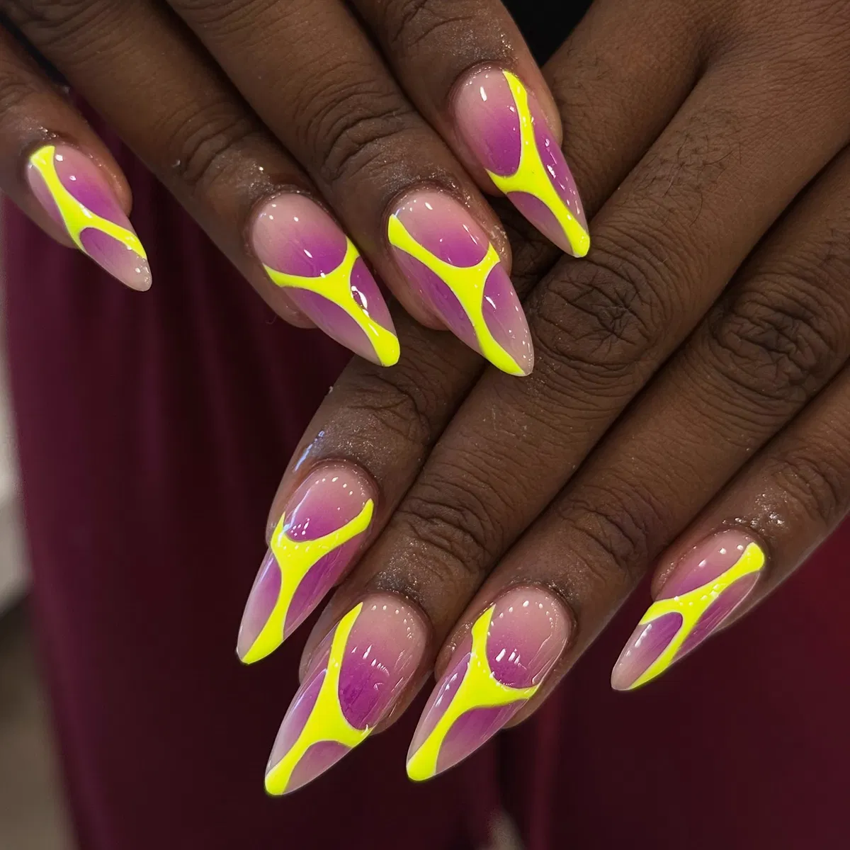 Abstract neon yellow lines over purple gradients