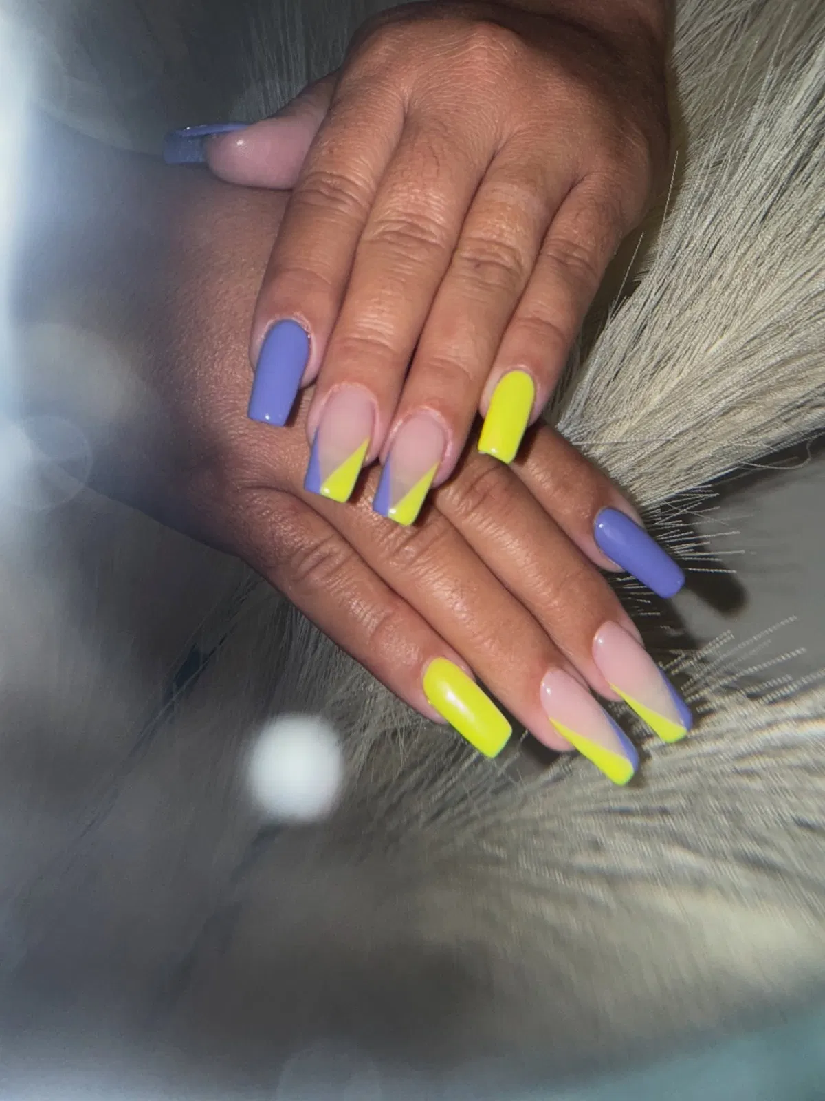 Color-blocked lavender and neon yellow with nude base