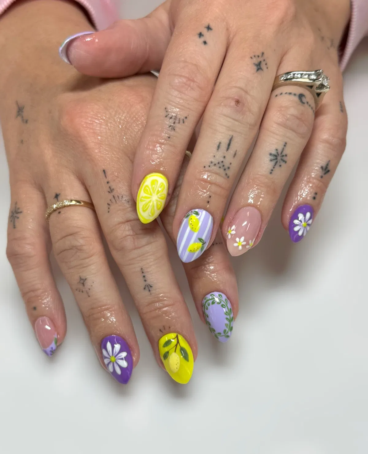 Lemon and floral nail art in lavender and yellow