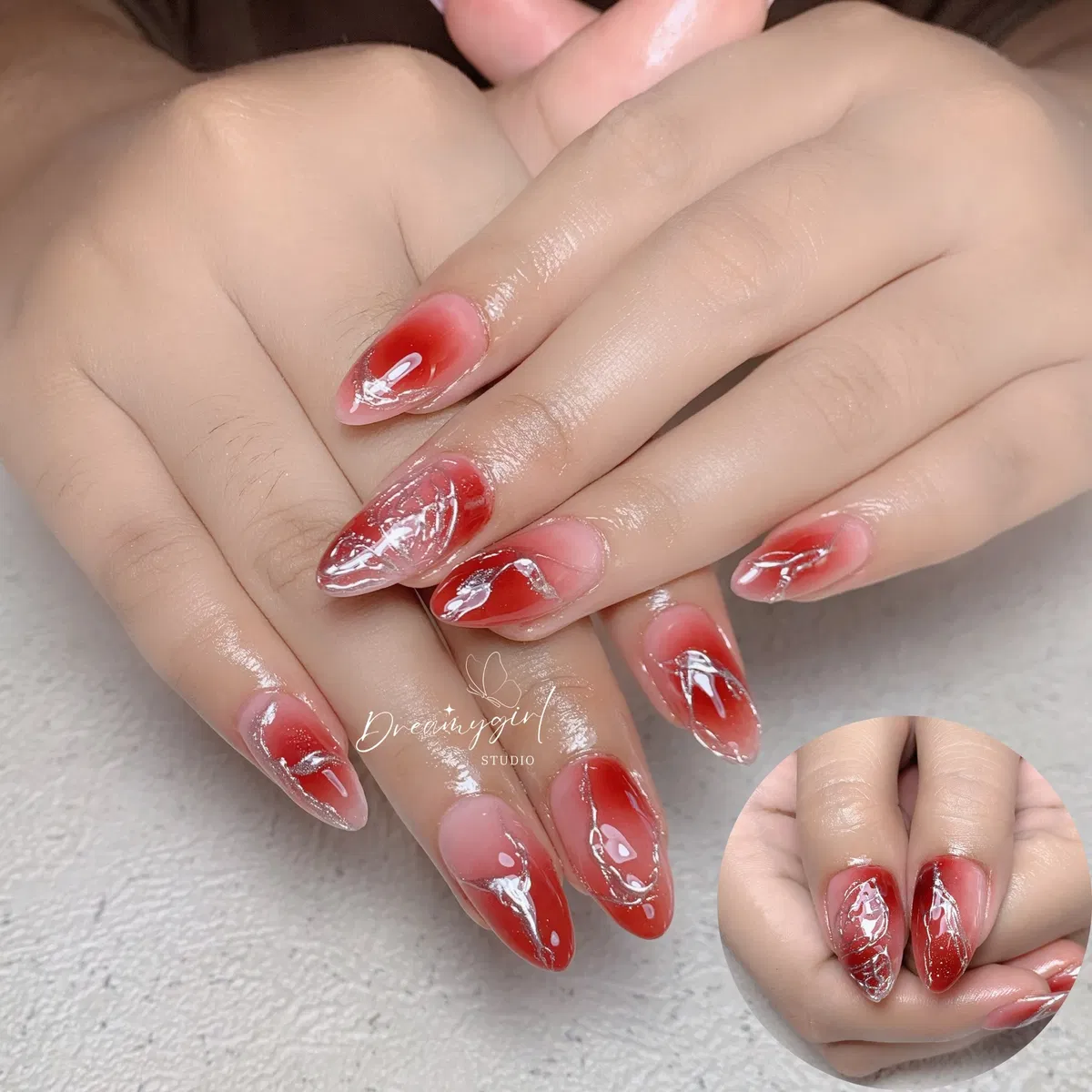 Red aura gradients with silver foil-like streak accents