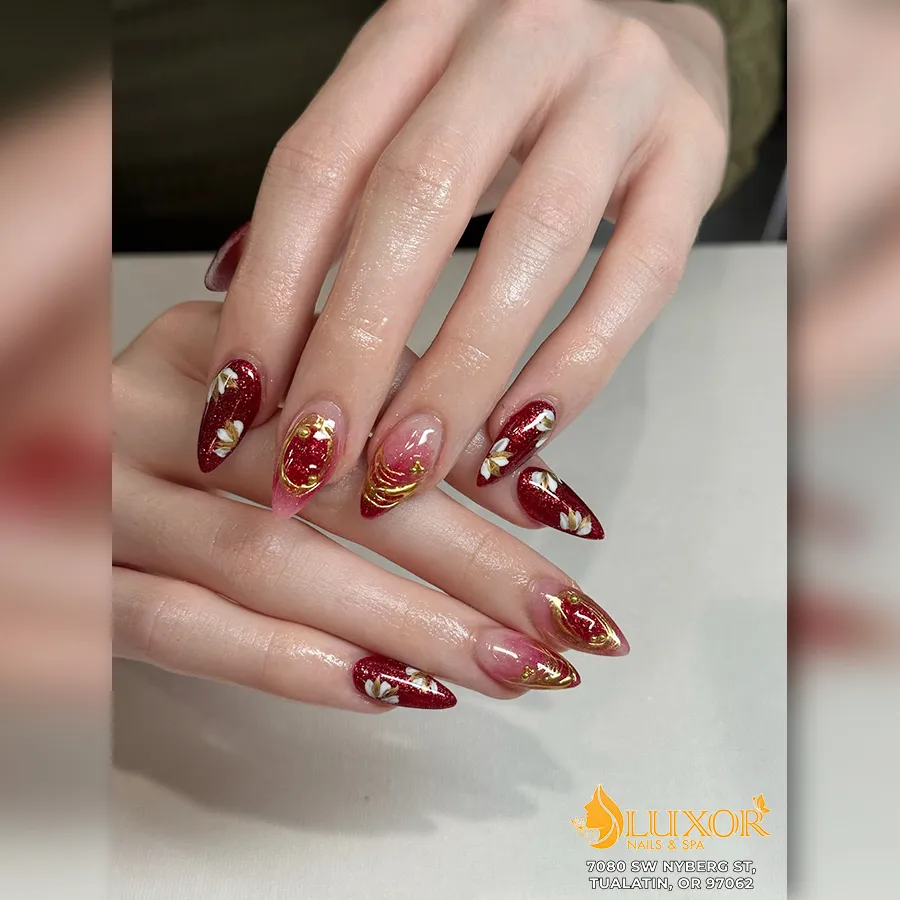 Deep red glitter look with gold and white petal accents