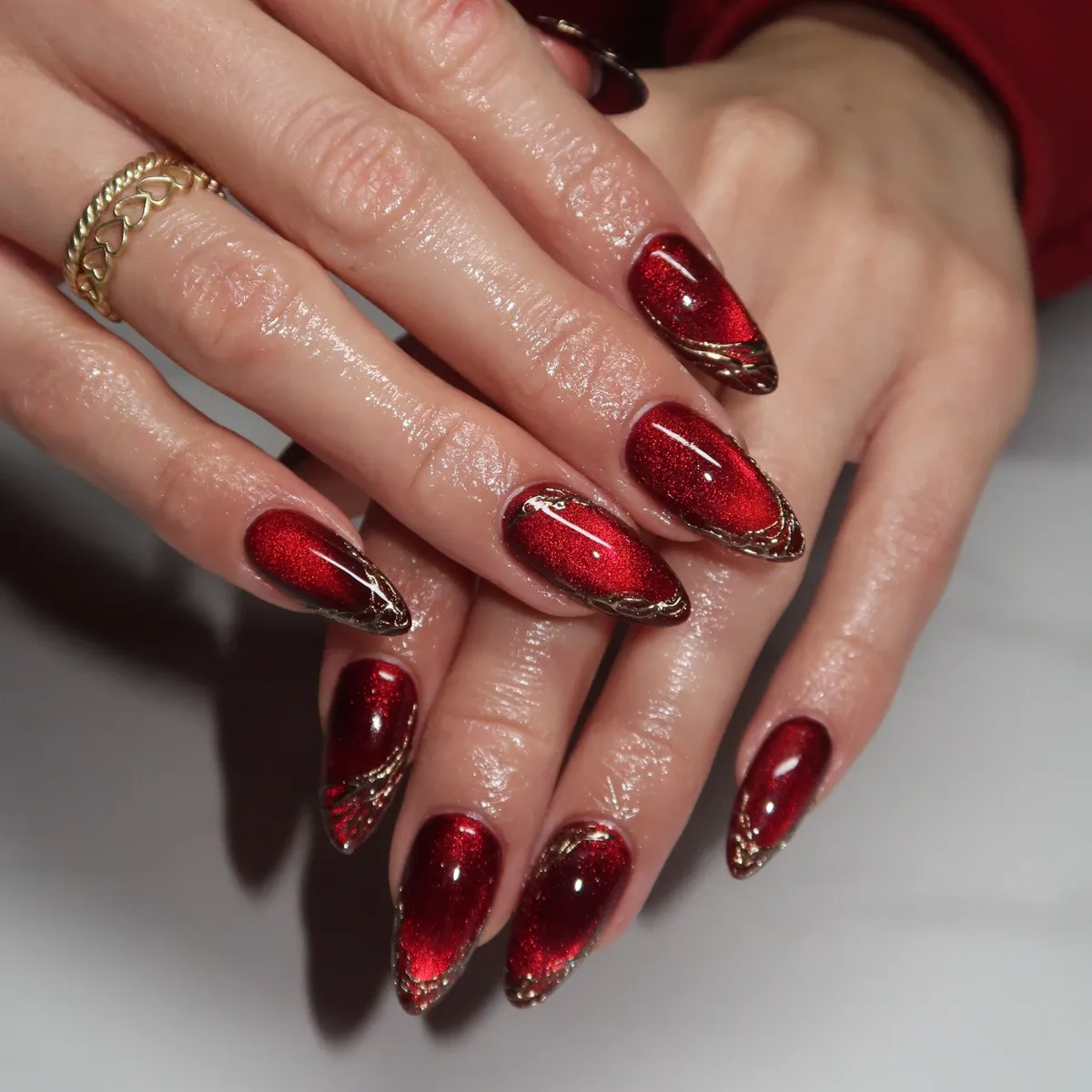 Deep red sparkle effect with gold edge detailing