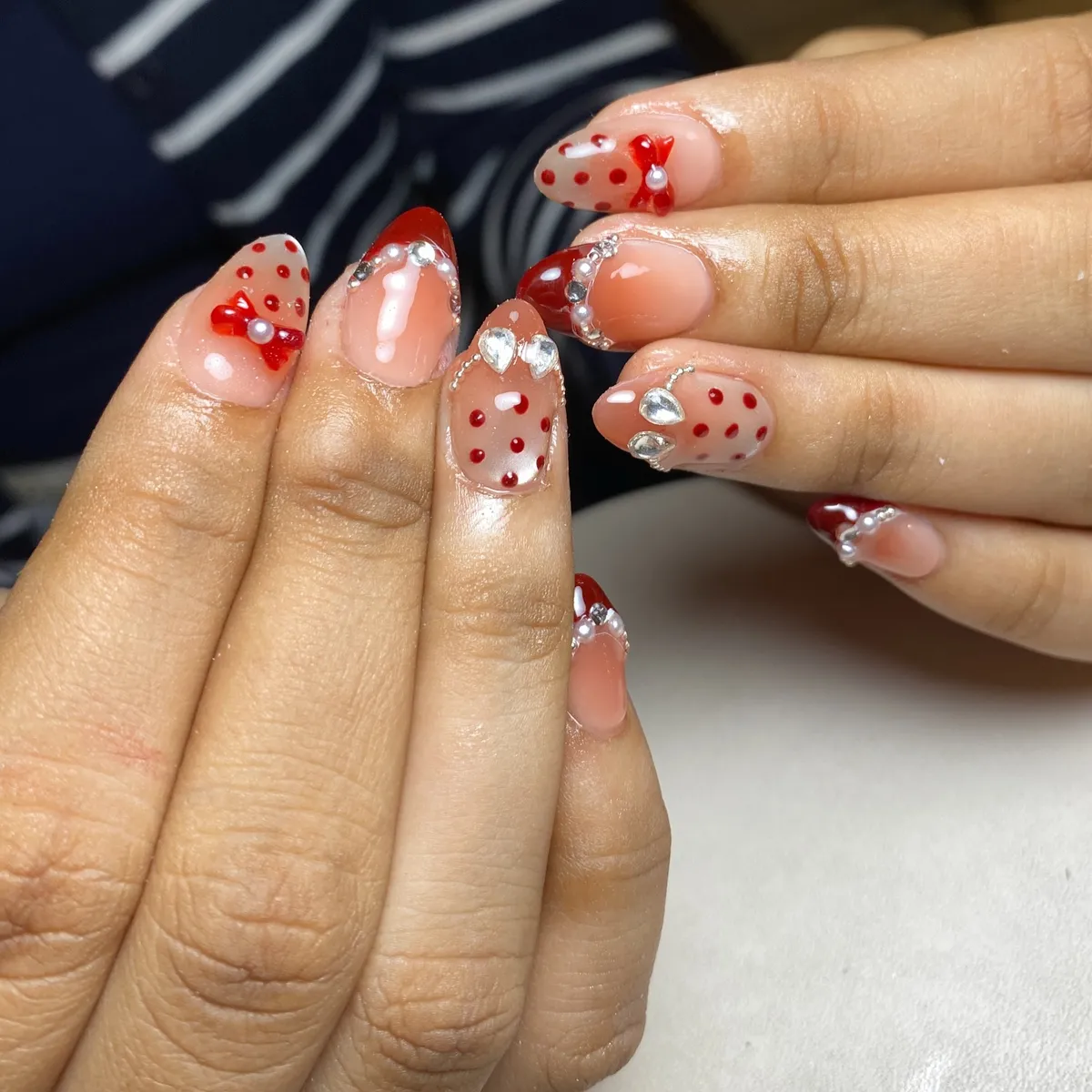 Red polka dots with 3D bow and rhinestone edging