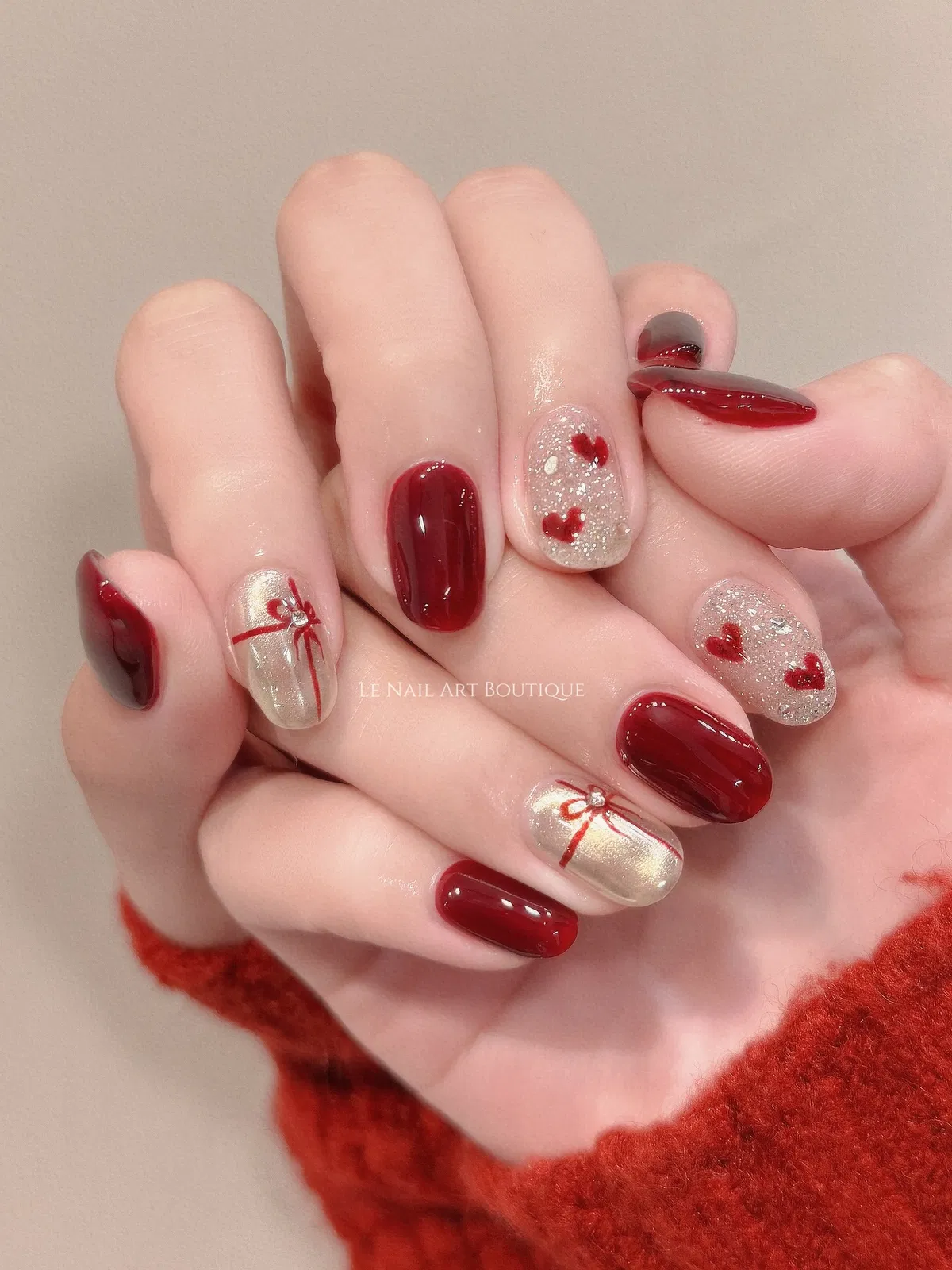 Deep red with glitter hearts and ribbon-bow accents