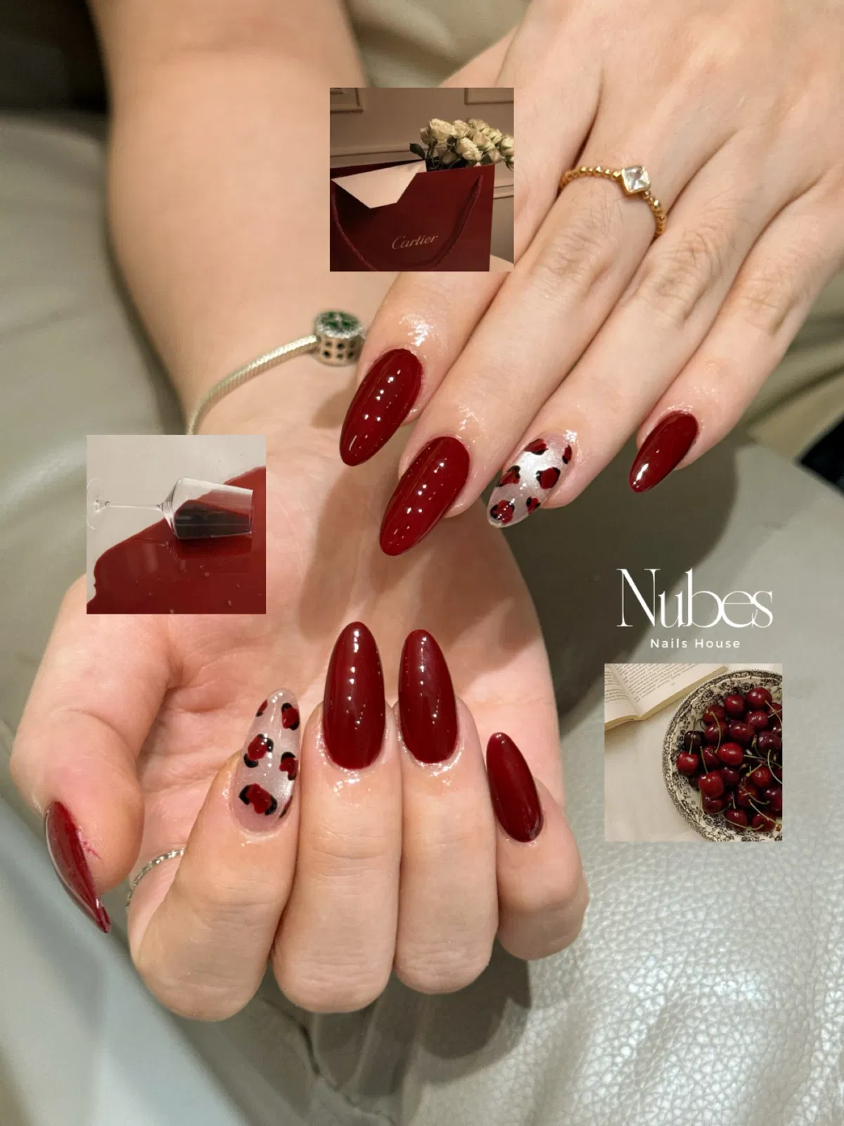 Deep red almond nails with spotted accent nails