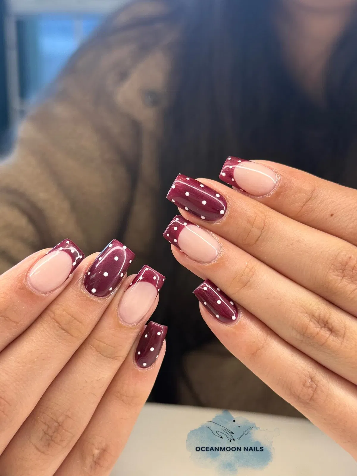 Burgundy French tips with white polka dots
