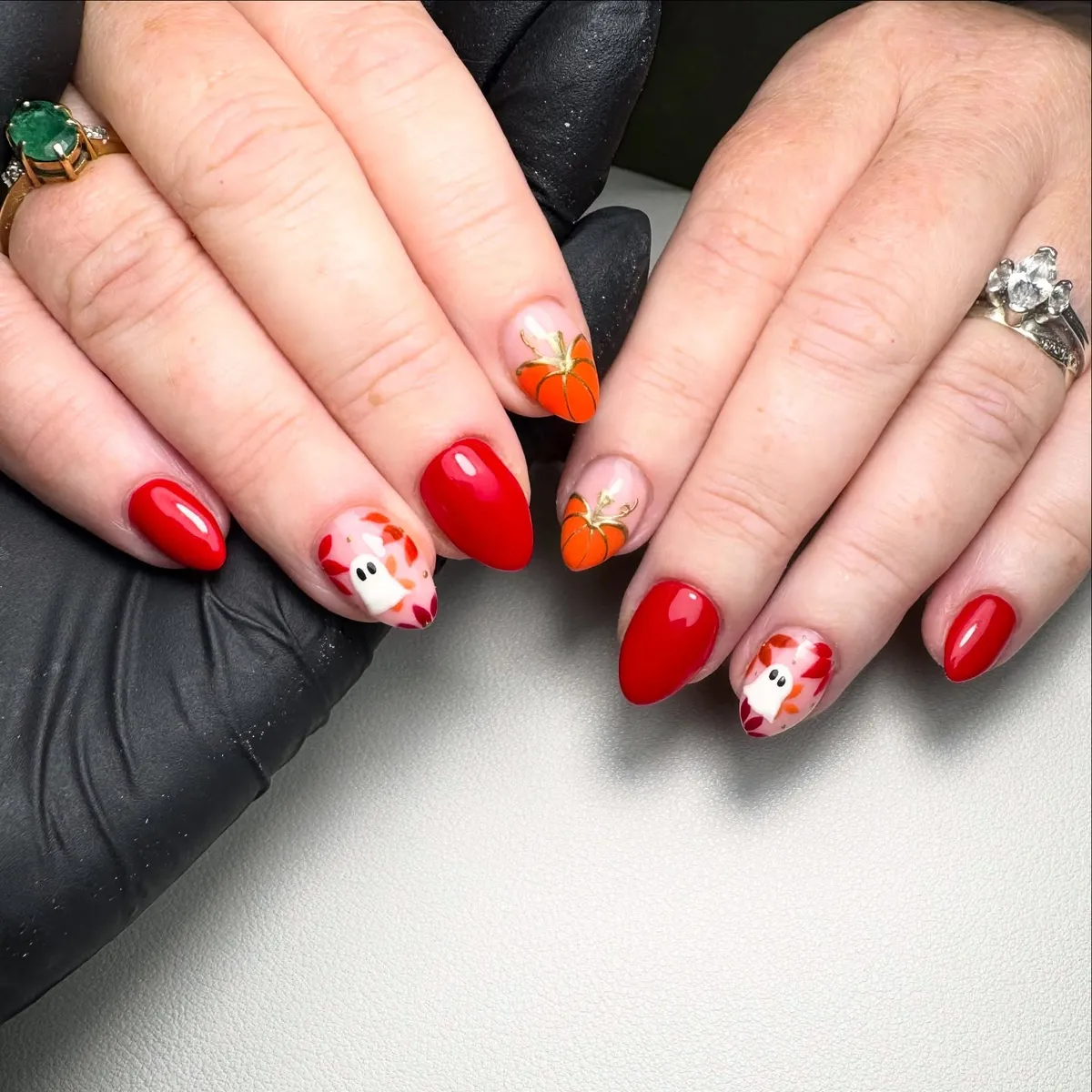 Bright red with pumpkin and ghost accent nail art