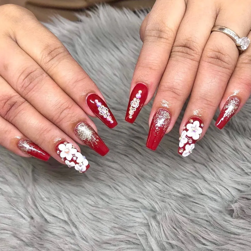 Red coffin nails with silver glitter and rhinestone lines