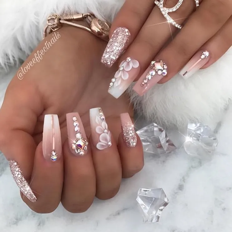Coffin nails with rose-gold glitter, rhinestones, and raised florals