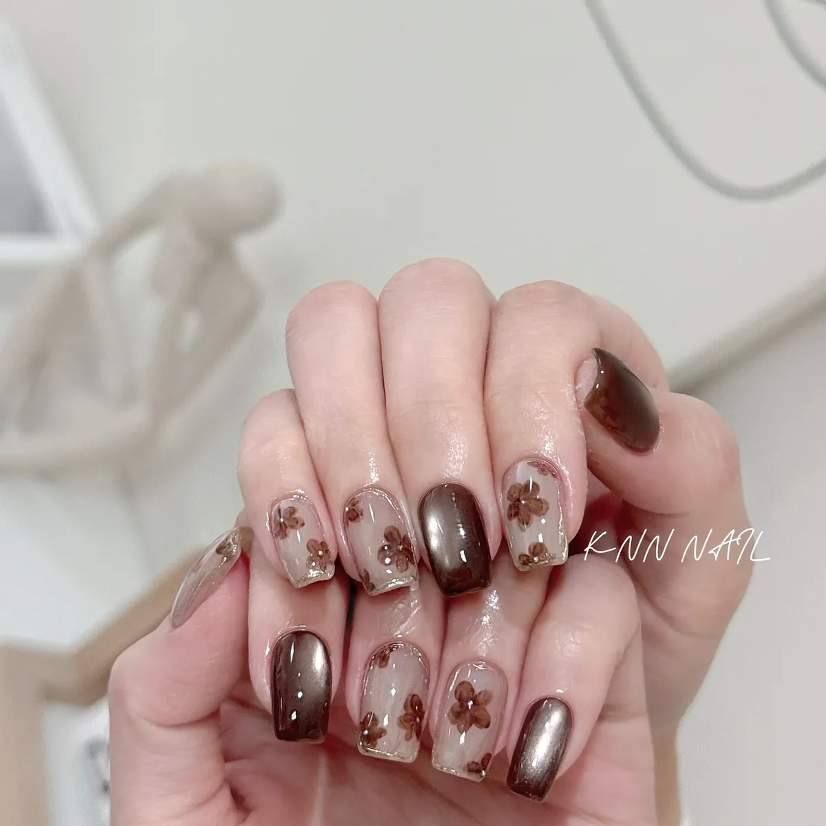 Metallic brown with translucent floral accents