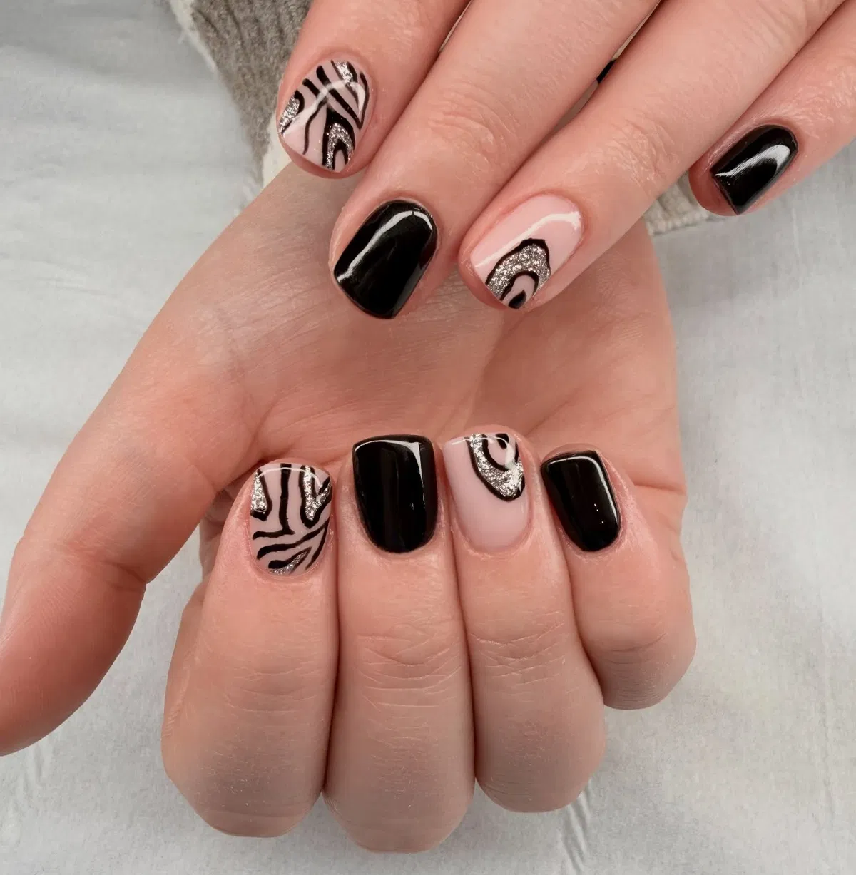 Black solids with zebra lines and glitter arcs