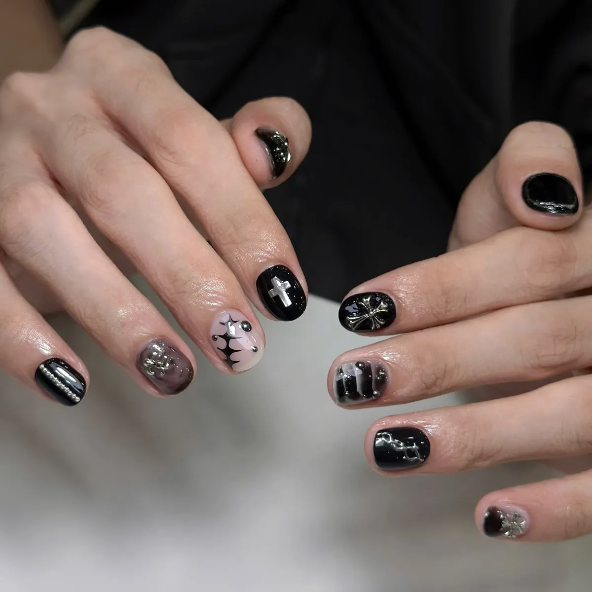 Mixed black set with metallic cross accent
