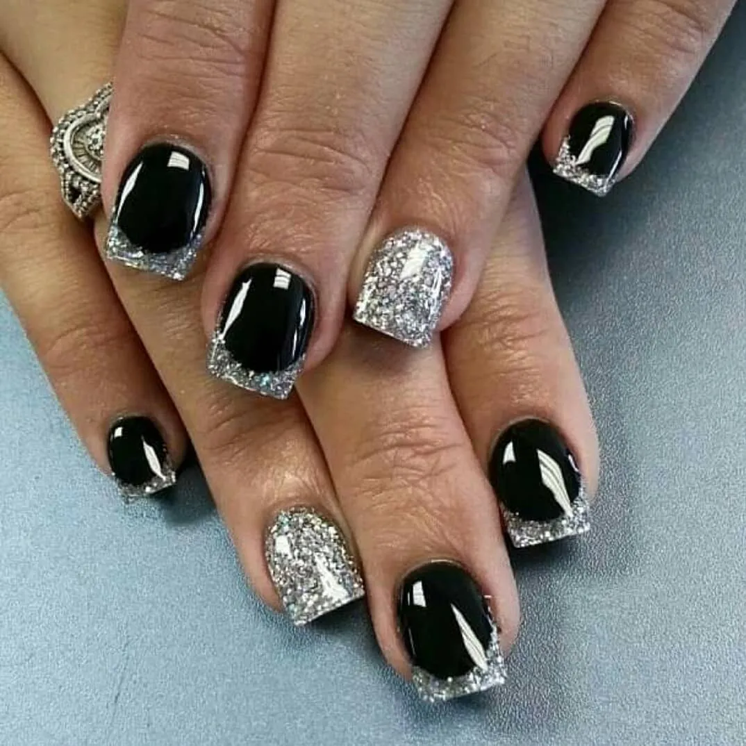 Glossy black with silver glitter tips