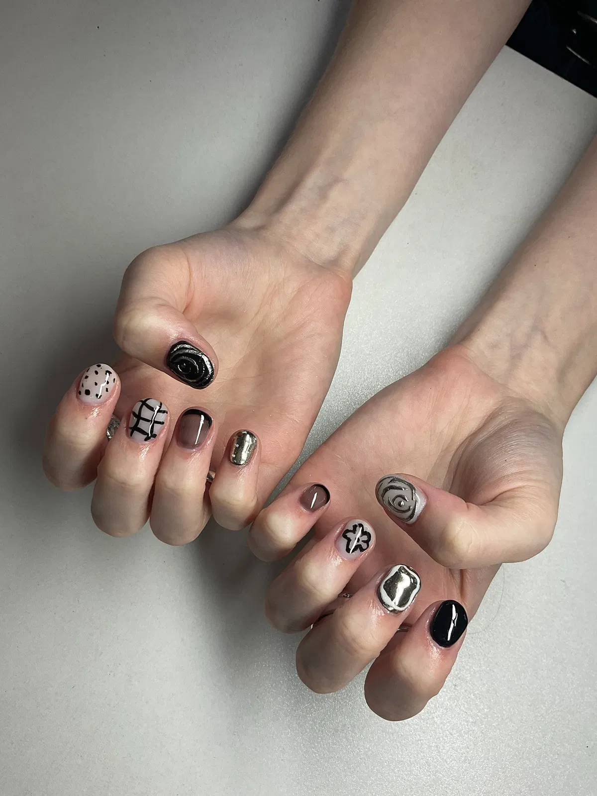Mixed monochrome set with spiral, grid, and flower