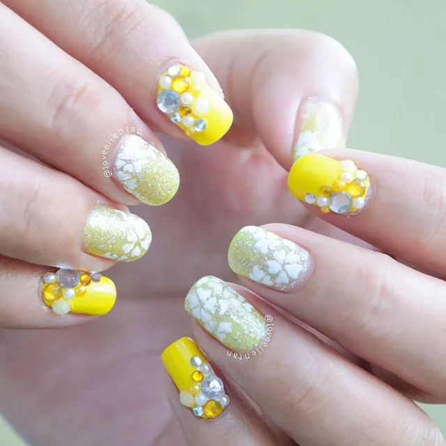 Yellow tips with glitter-crackle accents and gem clusters