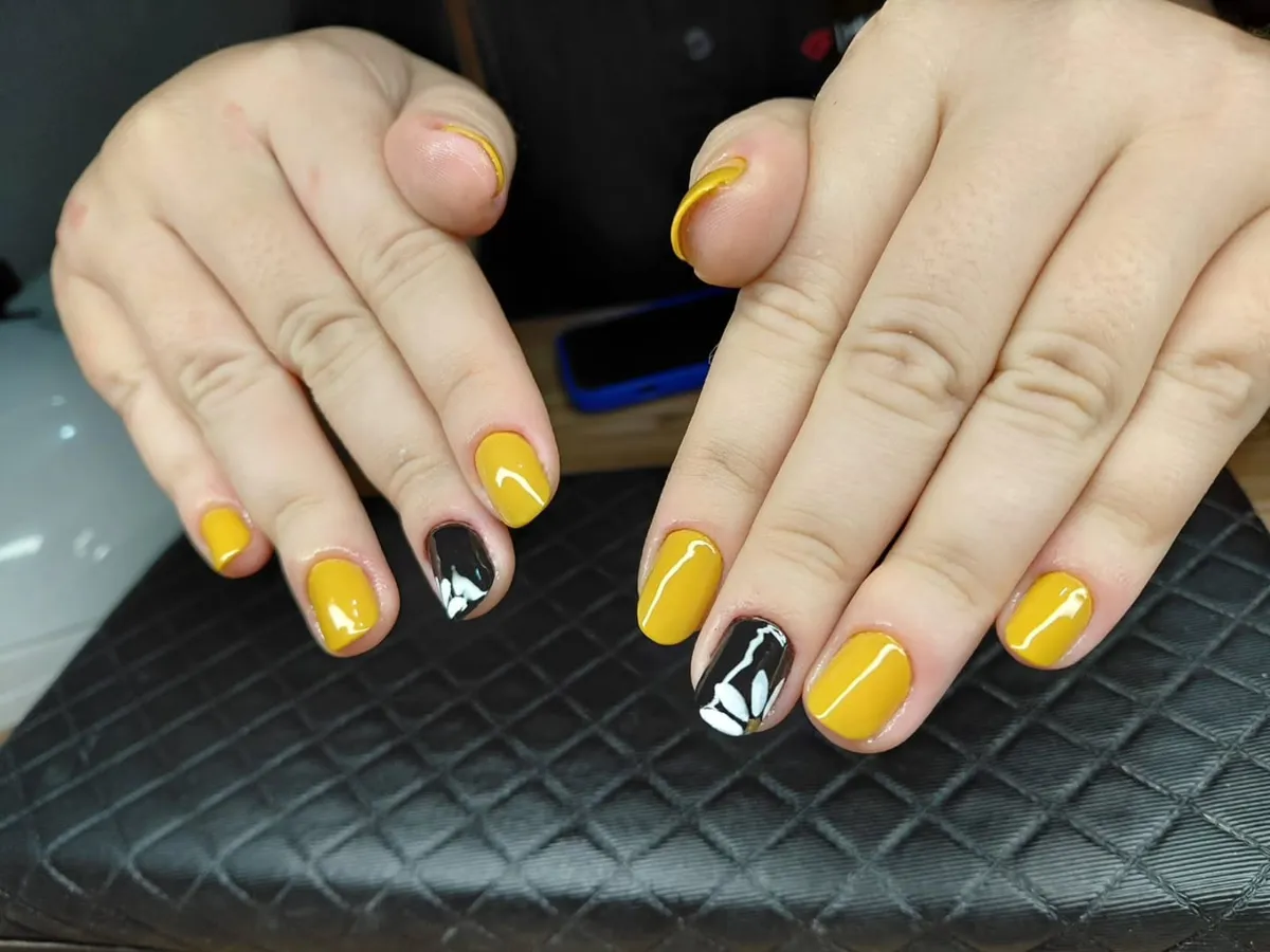 Mustard yellow with black-and-white floral accents