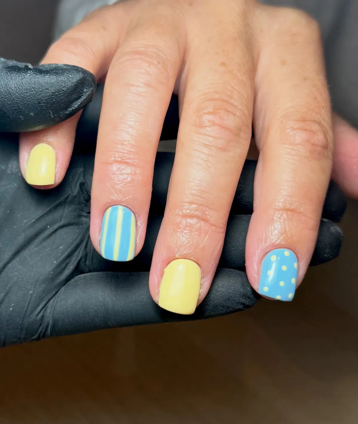 Pale yellow solids with blue striped and polka-dot accents