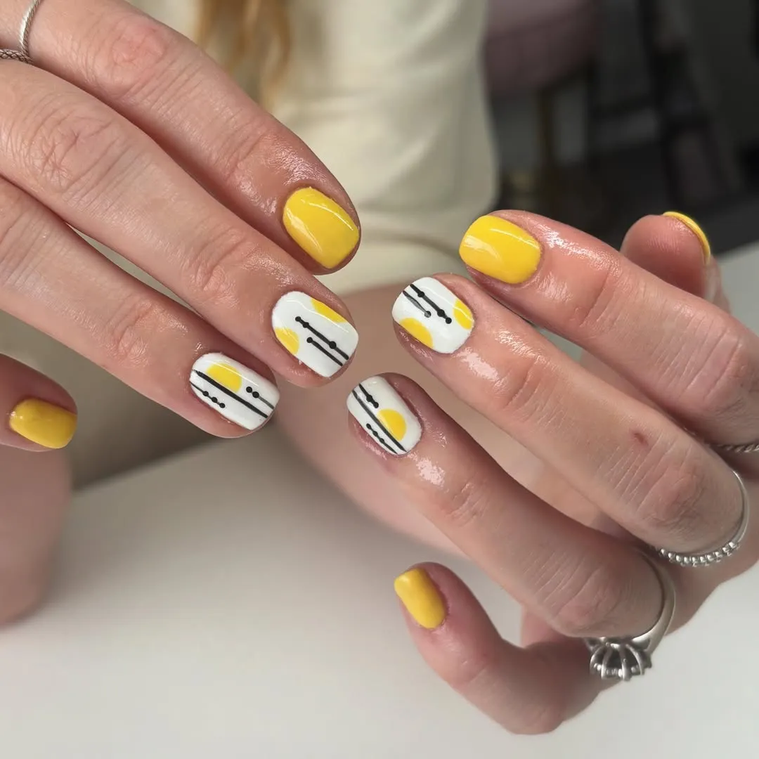 Bright yellow with white graphic accents in black and yellow
