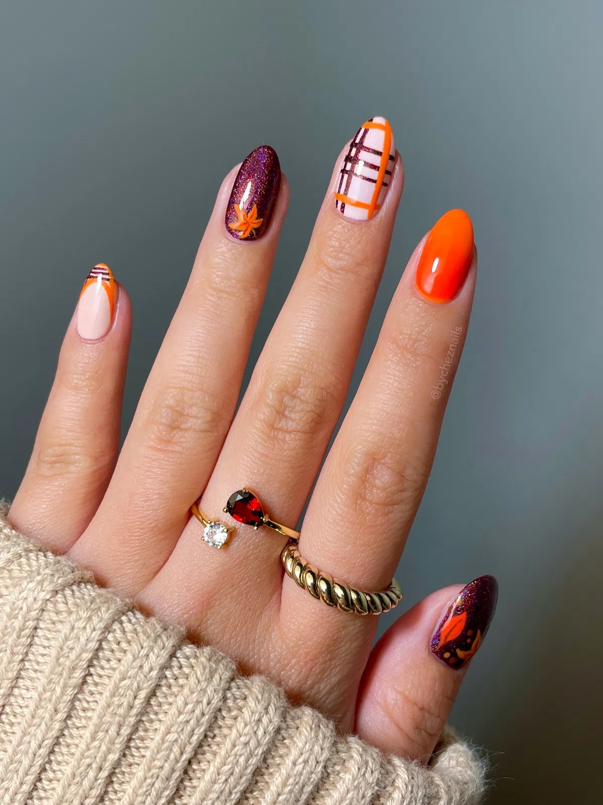 Orange and purple glitter with plaid and leaf accents