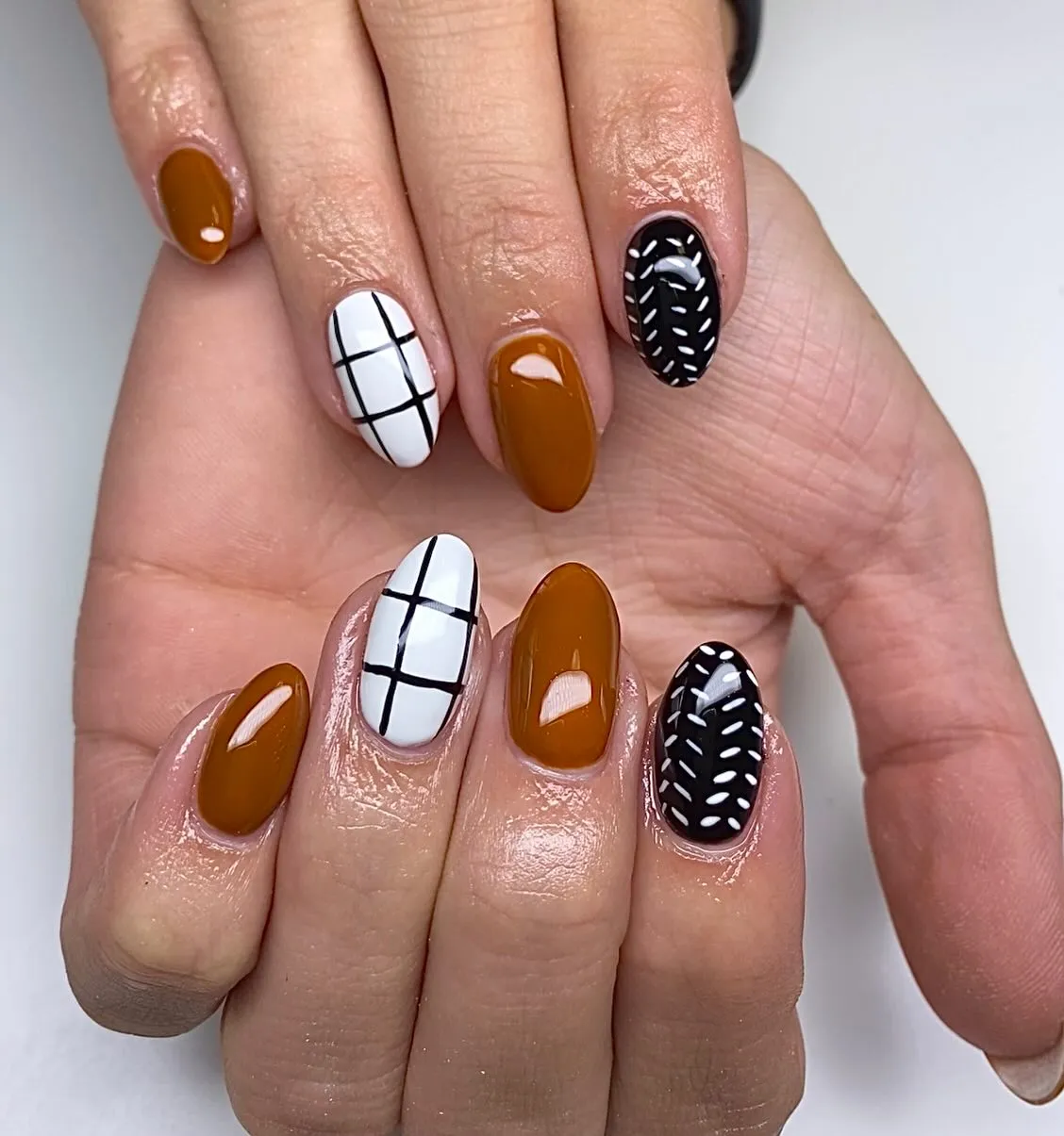 Mustard-brown with grid and stitched accents