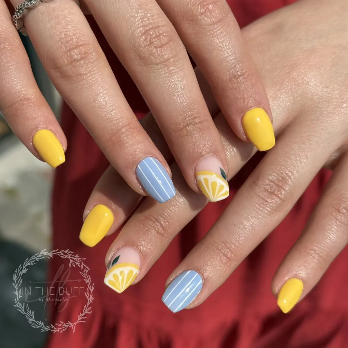 Bright yellow with blue pinstripes and lemon-slice accents