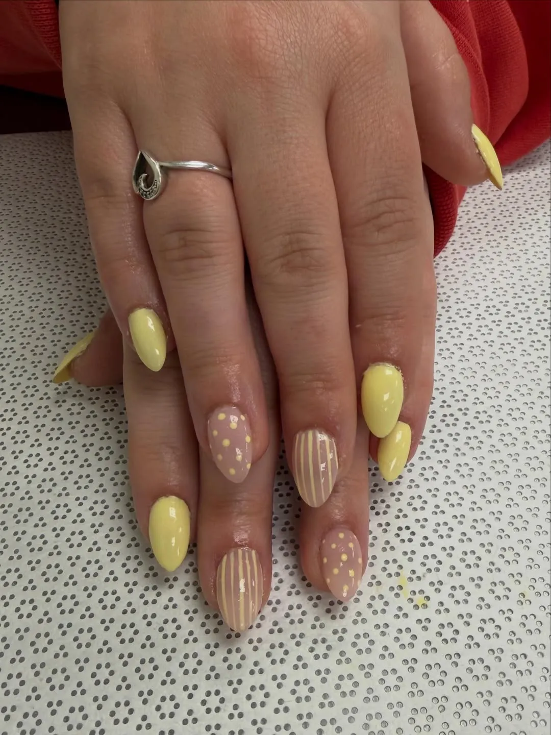 Pale yellow mix: solids, polka dots, and thin stripes