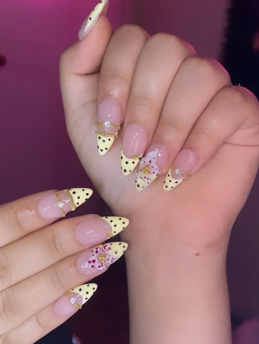 Pale yellow and nude set with red dot accents