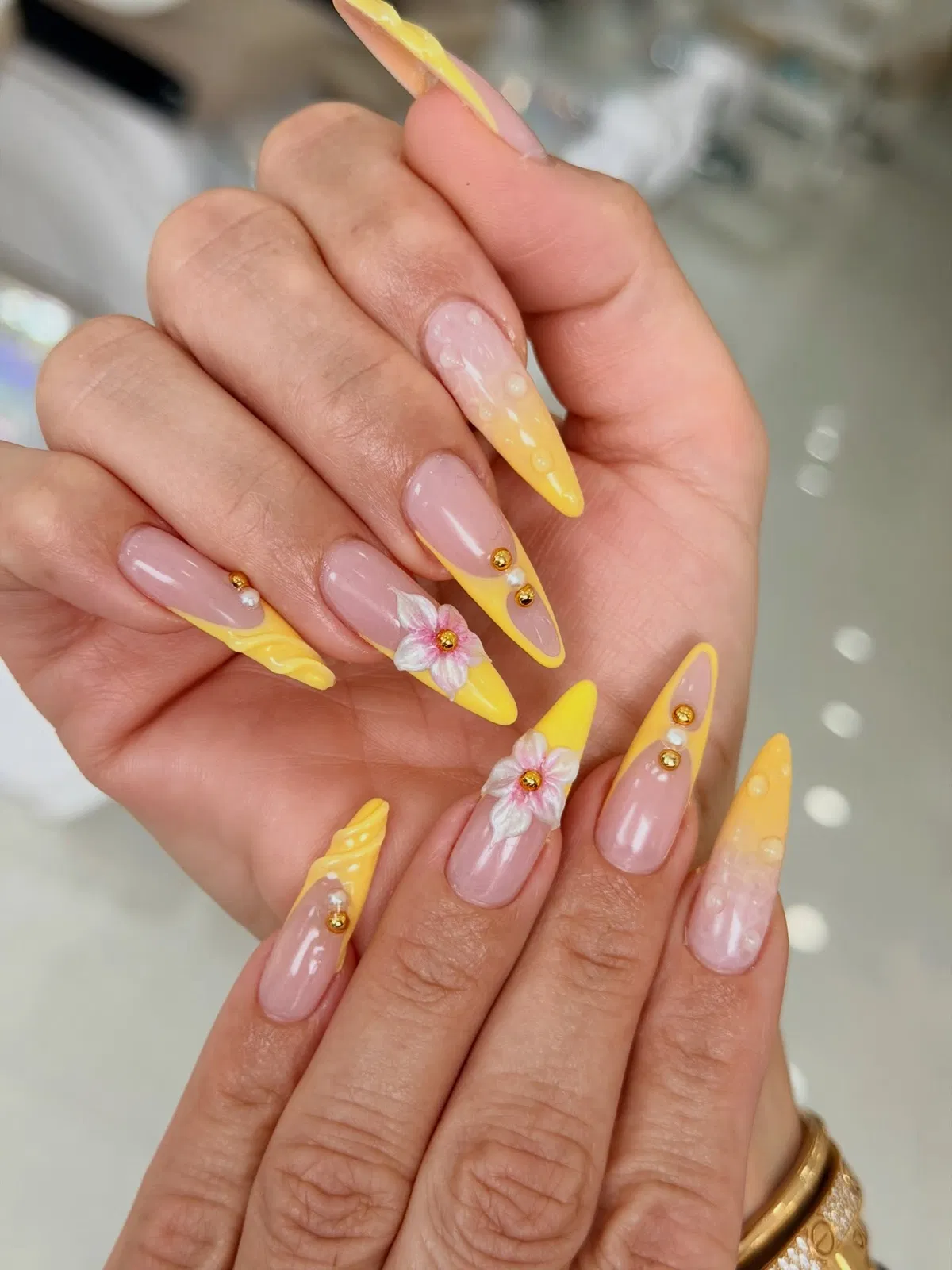 Yellow–orange gradients with gold studs and raised florals