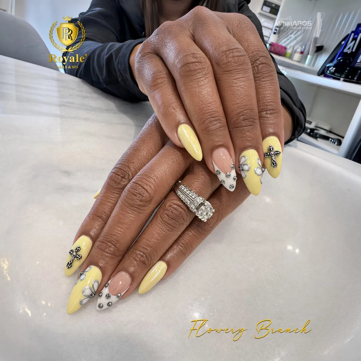 Neon yellow French tips with honeycomb pattern and shell-texture accent