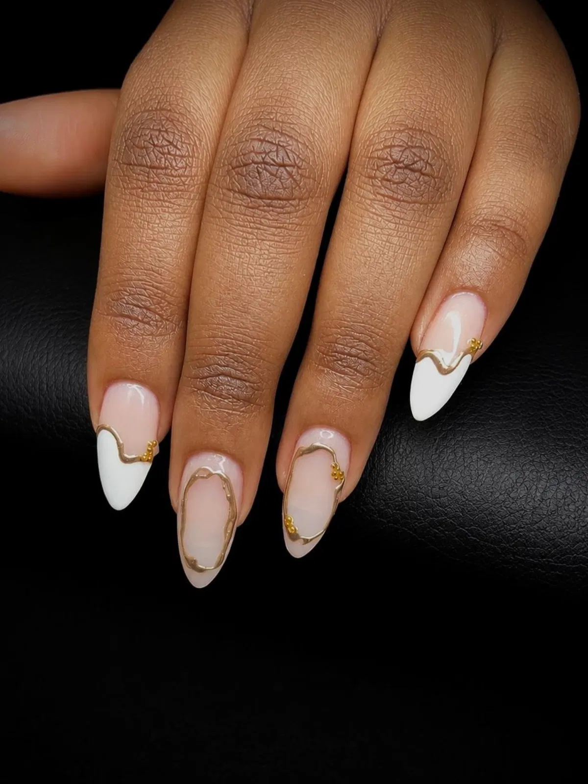 Wave-style white tips with gold raised outline accents