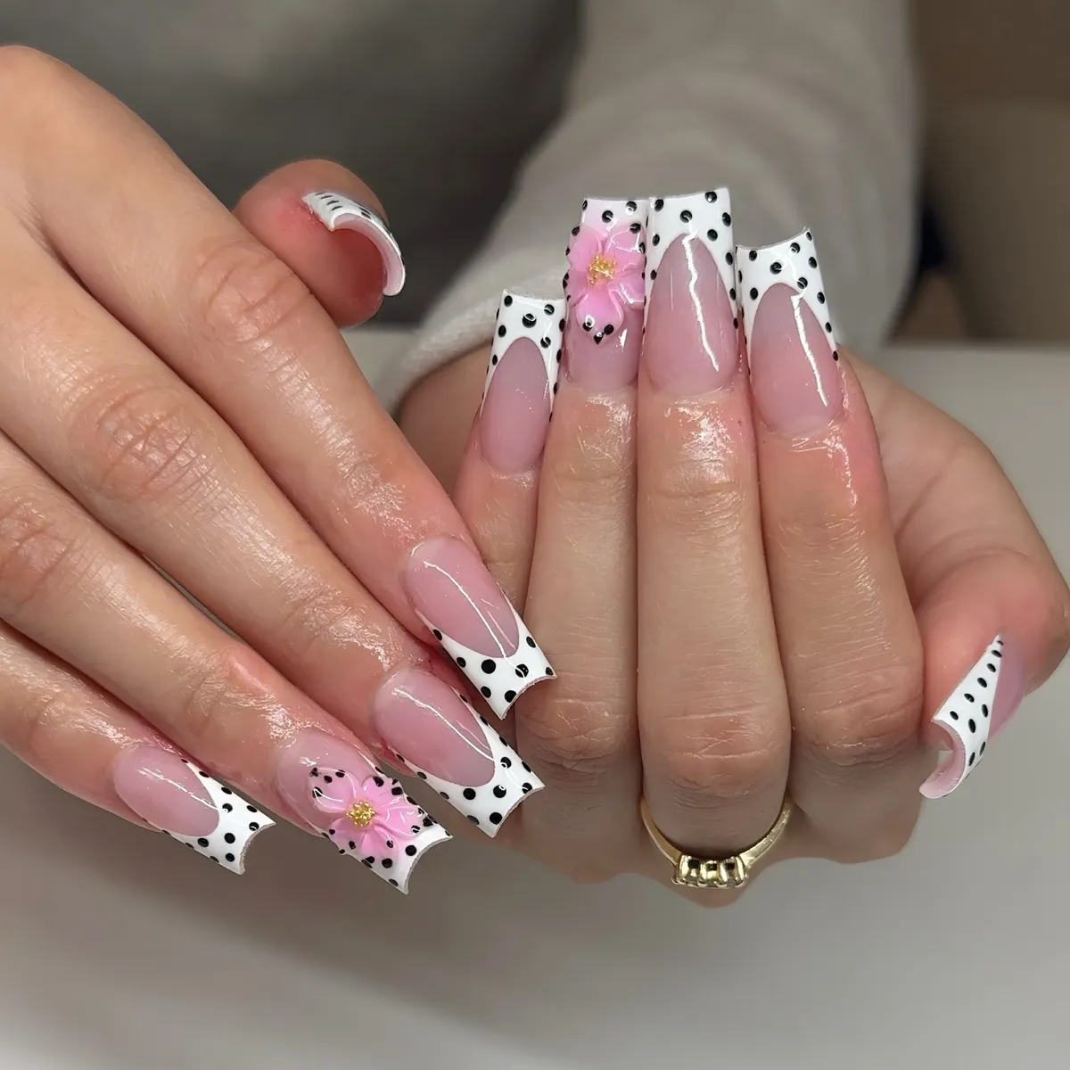 Polka-dot White French Tips with Pink Flower Accent